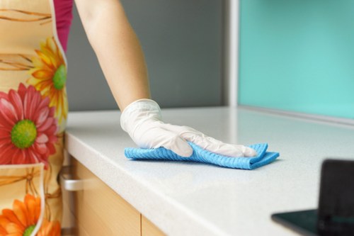 After builders cleaning removing dust and debris from a renovated property in Deepcleaning