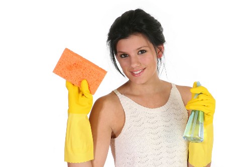 Local floor cleaning service treating grout lines and busy hallway flooring