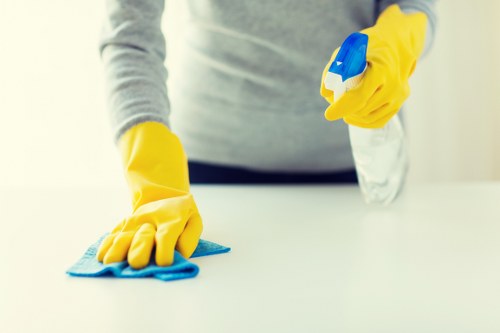 Machine cleaning of a hard floor surface with careful local floor care